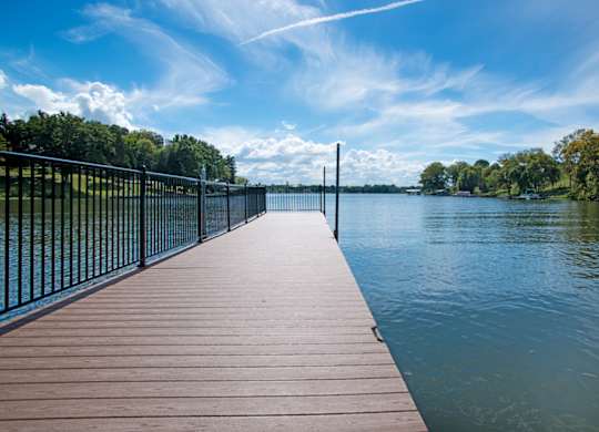 Lake dock with fence at Ventana at The Lake, Hendersonville, TN 37075.